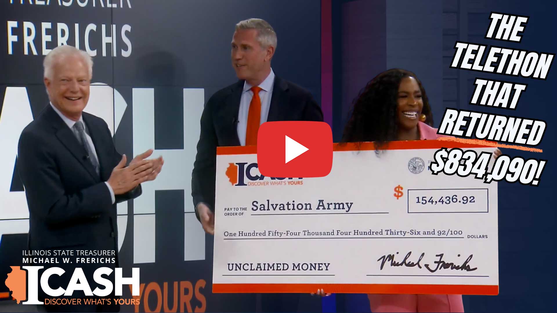 Video: Treasurer Frerichs and a woman present an oversized check to a man from the Salvation Army
